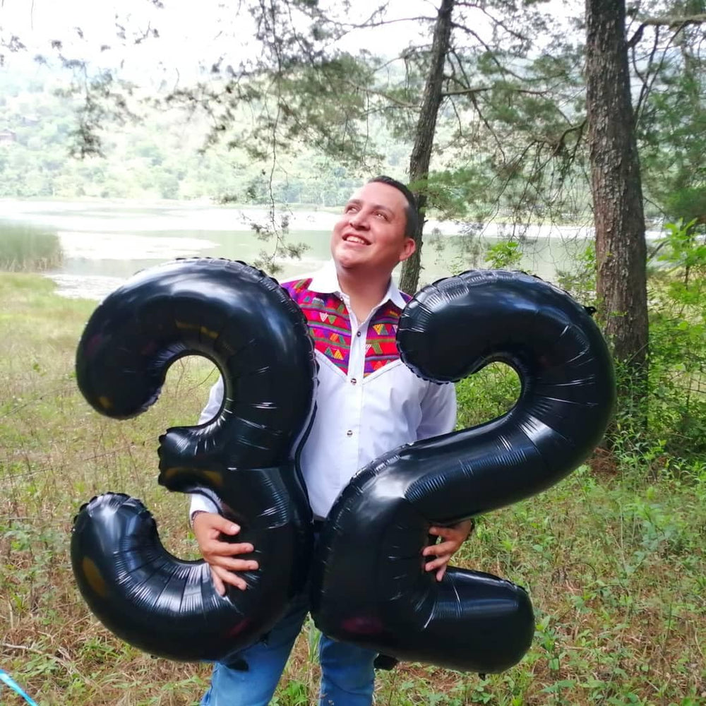 IWERP black number 14 balloon creates a dramatic backdrop