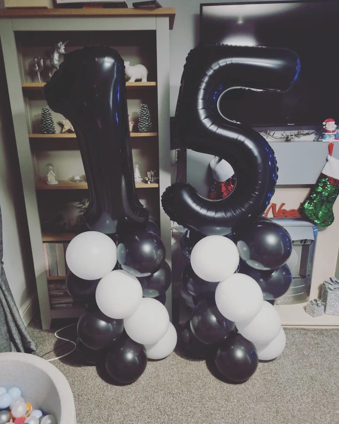 IWERP black foil 15-number balloon adds elegant decor for celebrations.