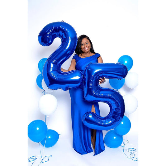 IWERP blue metallic 25 balloon highlights milestone moments in photos.