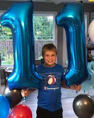 IWERP Blue 11 numeral foil balloon adds versatile party styling.