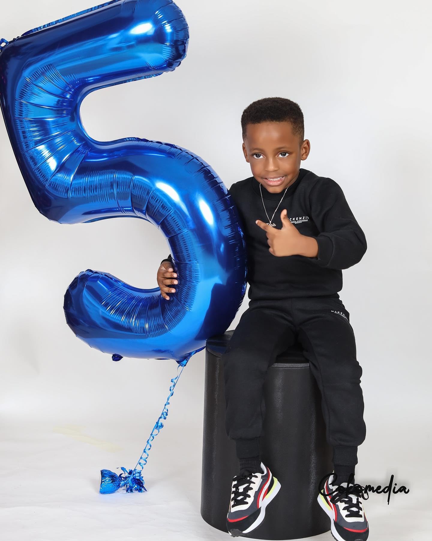 IWERP blue party decor complements themes and photo ops at anniversaries.