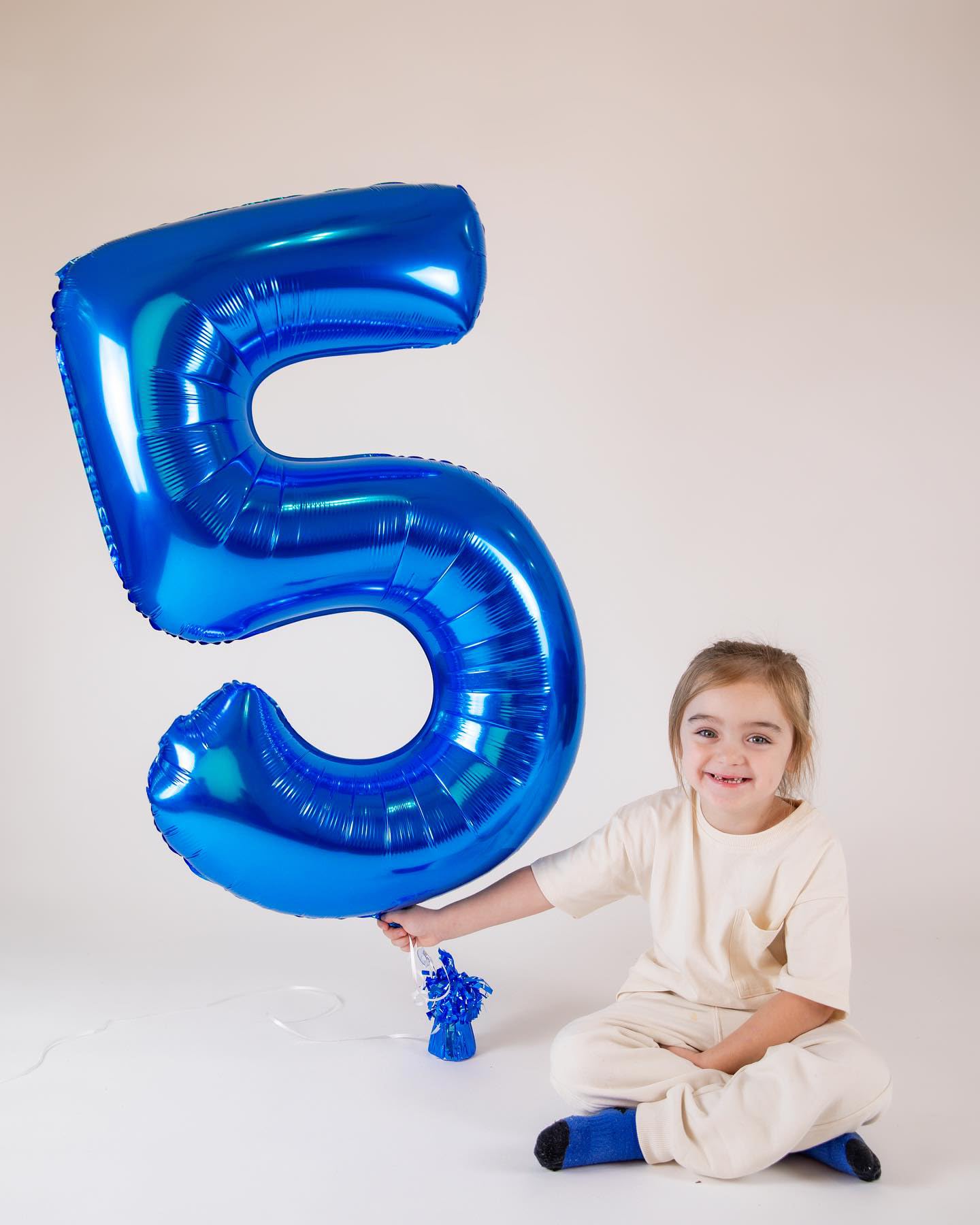 IWERP Blue number decor complements other birthday themes