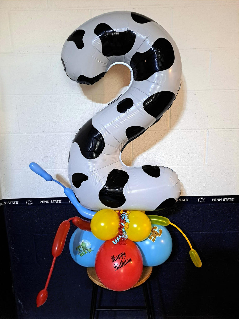 IWERP cow print 3 balloon party scene evokes farm fun