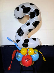IWERP cow print 3 balloon party scene evokes farm fun