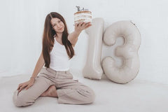 IWERP cream 40-inch number balloons add a striking focal point to celebrations.
