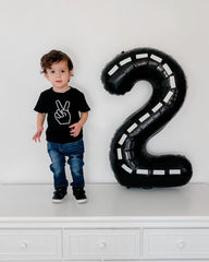 IWERP fourth birthday decor brightens entrances with festive color.