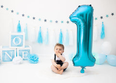 IWERP giant number 1 balloon creates a focal point for first birthday celebrations.