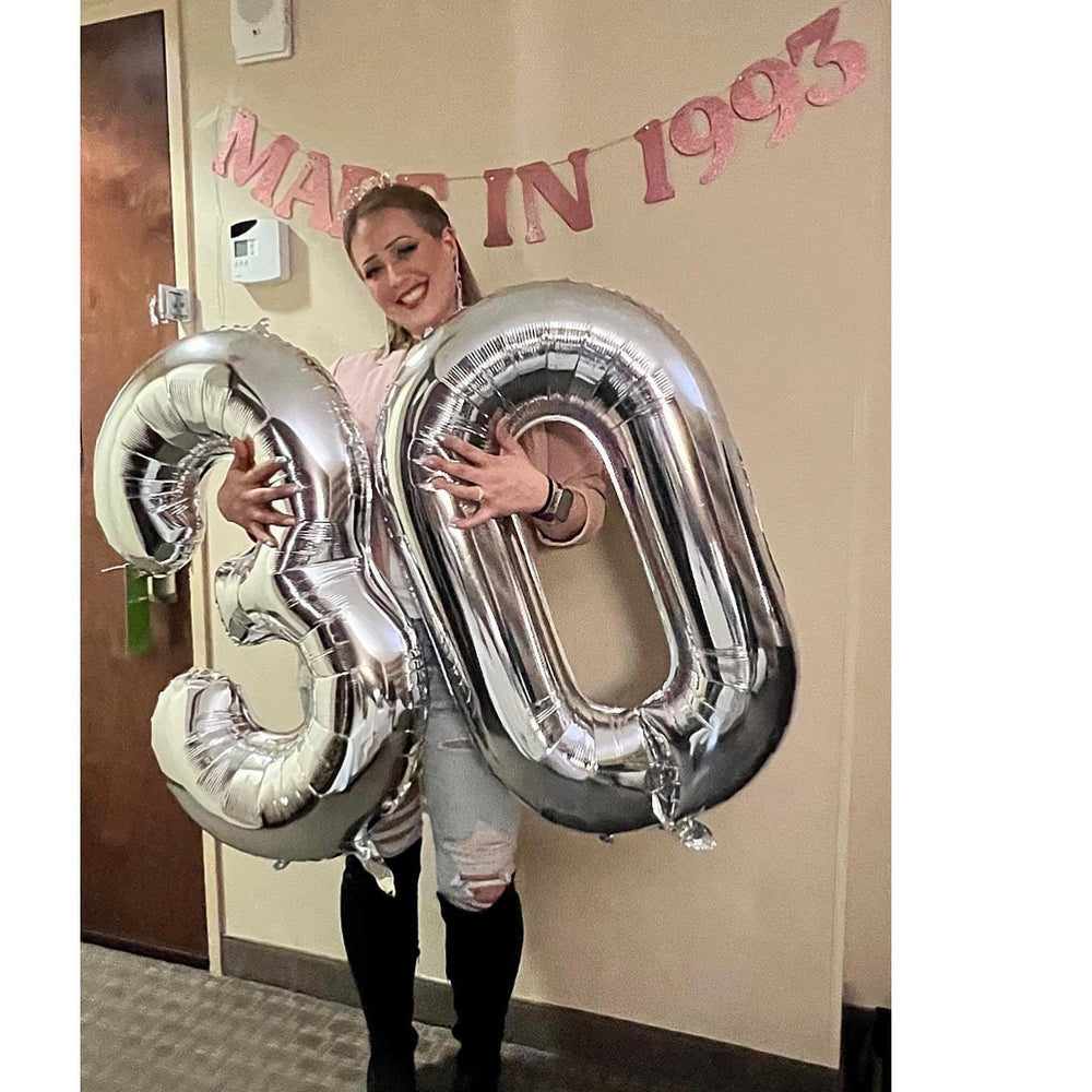 IWERP glamorous silver balloon decor for upscale celebrations.