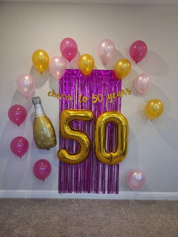 IWERP glimmering-gold-finish-balloon enhances lighting and creates a luxe vibe.