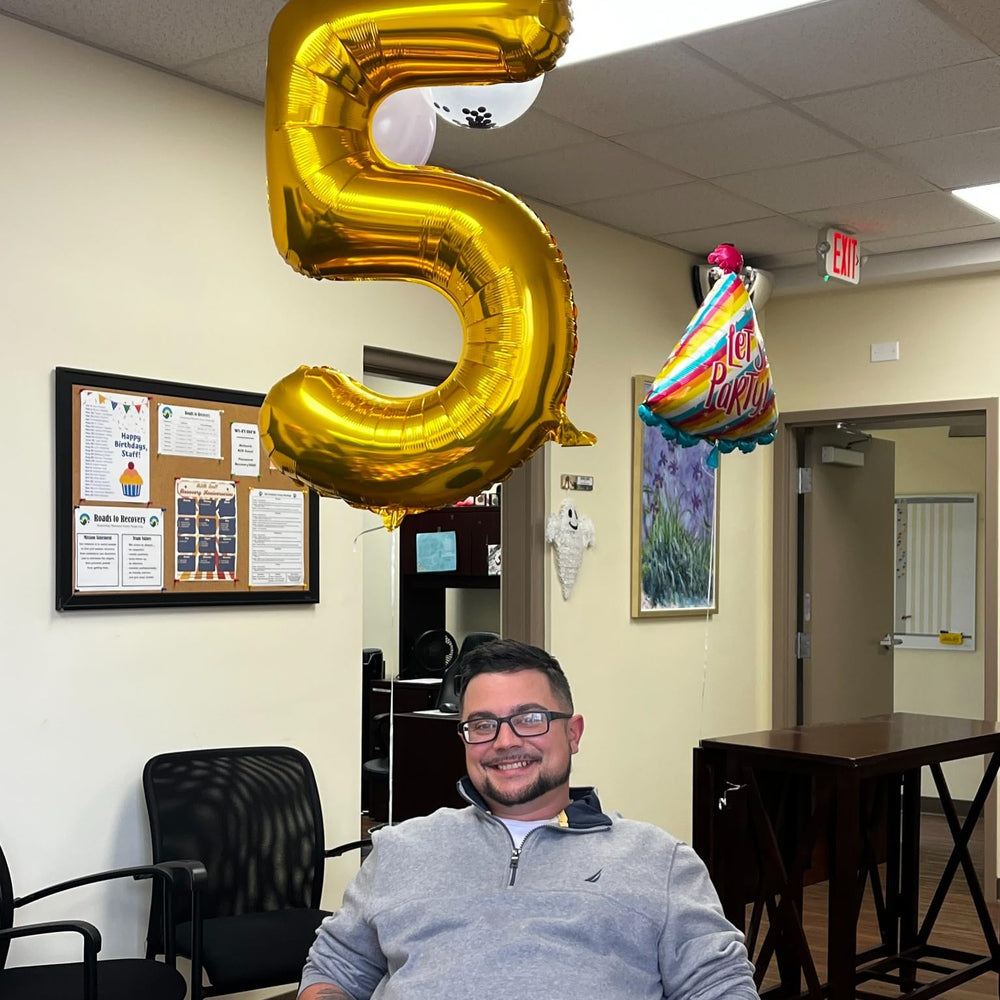 IWERP gold 3-year birthday balloon elevates party styling.