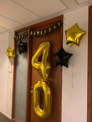 IWERP Gold finish balloon adds luxury and a focal point.