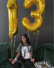 IWERP gold number 13 balloon backdrop adds elegance to any party setup.