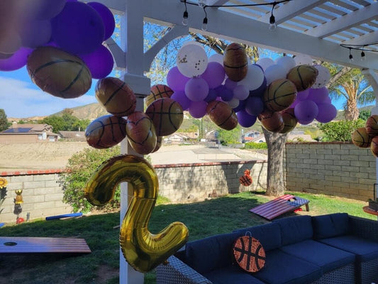 IWERP Gold Number 2 balloon 40-inch used as photo backdrop and centerpiece