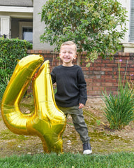 IWERP Gold Number 4 Balloon entrance display adds festive shine to party arrivals.