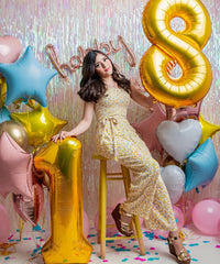 IWERP gold number 8 balloon photo backdrop to elevate birthday memories.