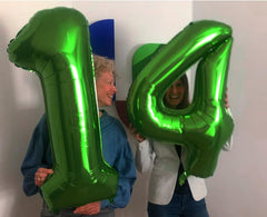 IWERP green 10 balloon display for birthdays and anniversaries with elegant shine.