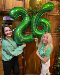 IWERP green 40-inch number balloon doubles as a backdrop prop