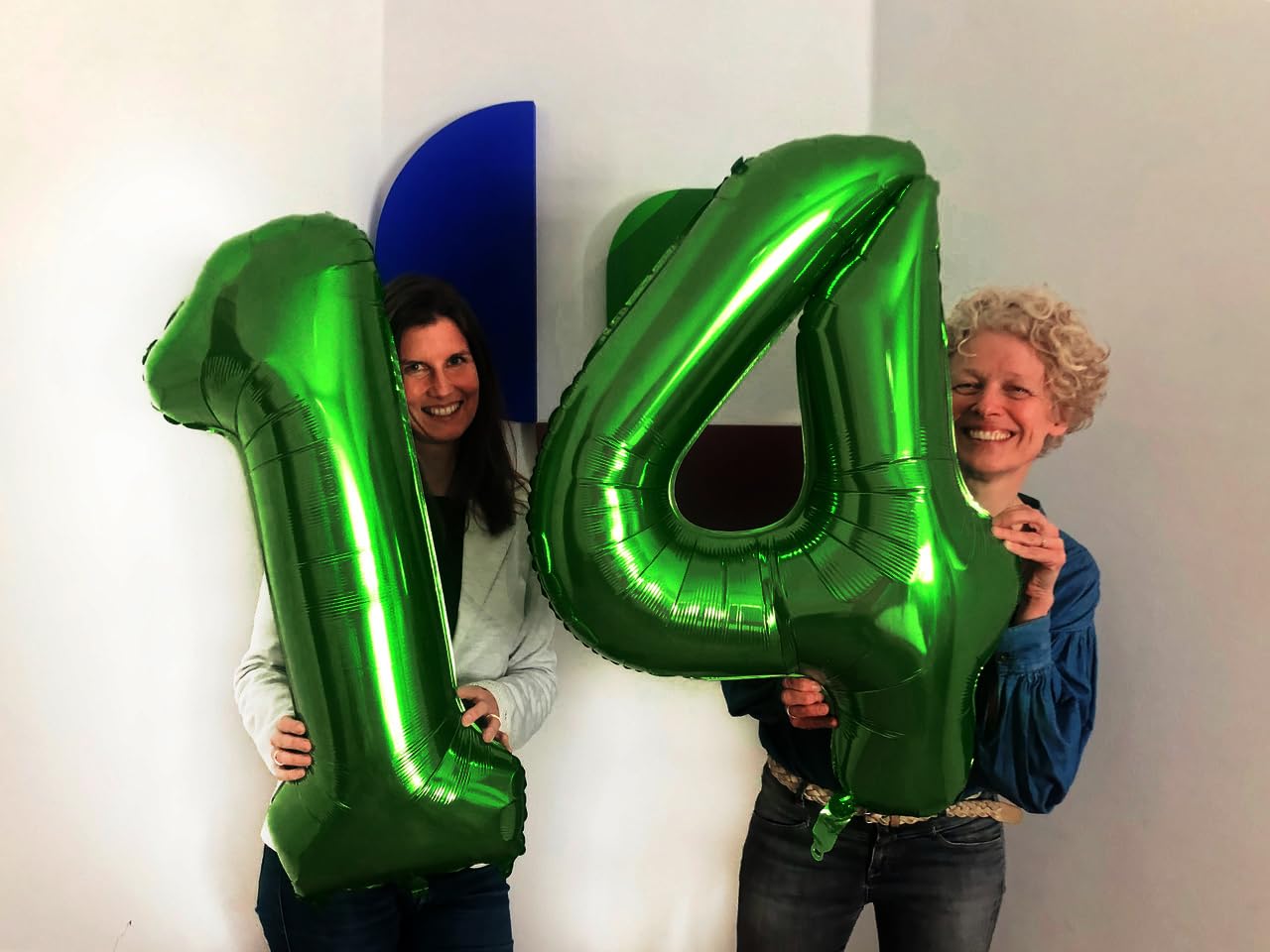 IWERP green birthday decor backdrop with number 14 creates a memorable party scene