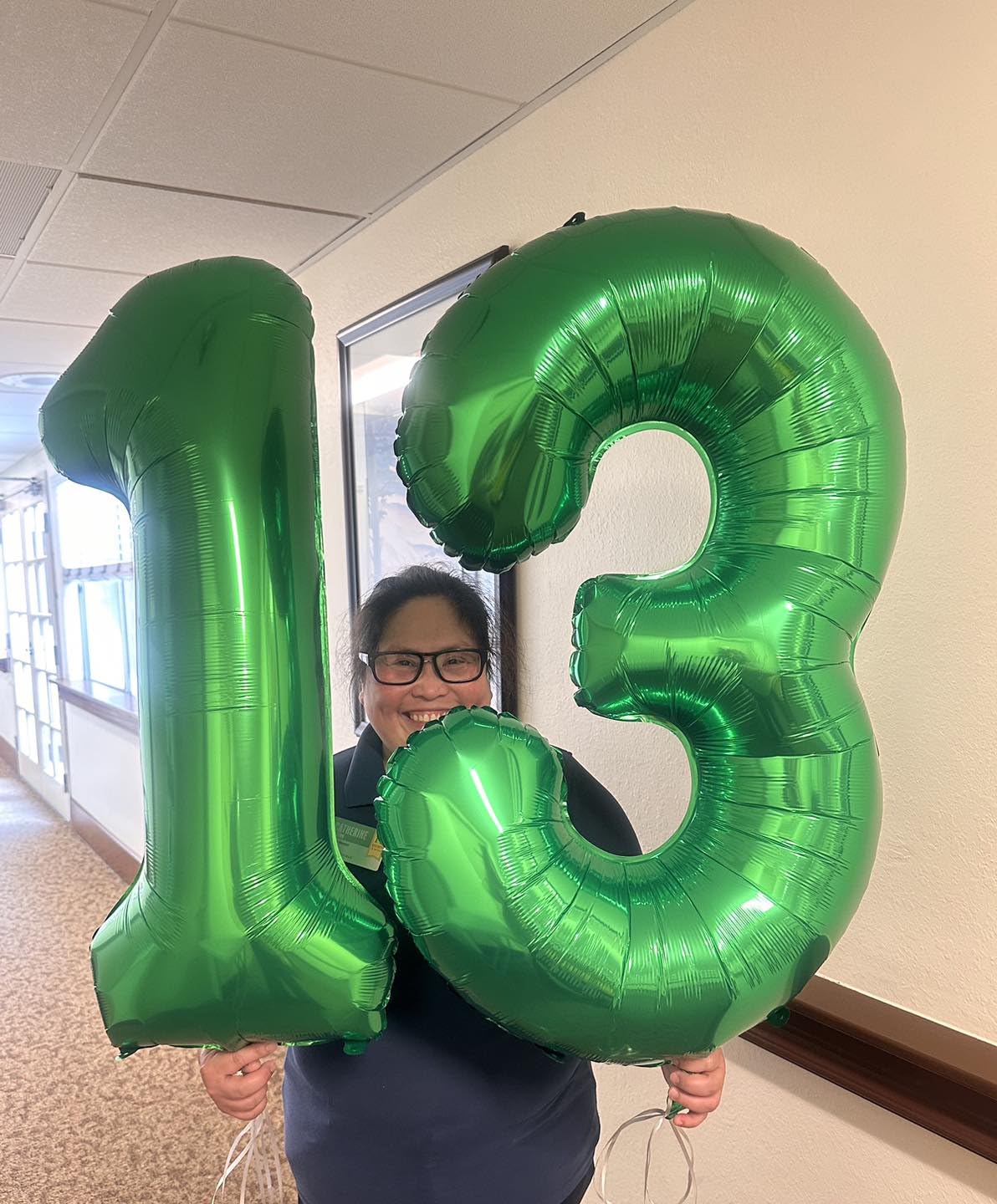 IWERP green birthday decor 13 balloon enhances entrance decoration.