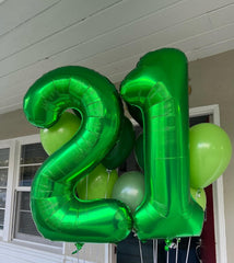 IWERP green birthday foil balloon adds lasting festive color to celebrations.
