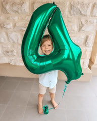 IWERP green number 4 balloon front view enhances centerpiece decor.