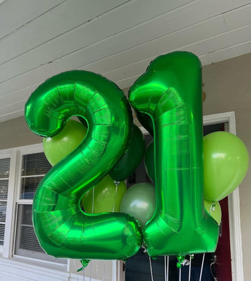 IWERP green 40th balloon floats for a striking ceiling display.
