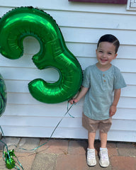 IWERP green number 5 balloon entrance decor welcomes guests.