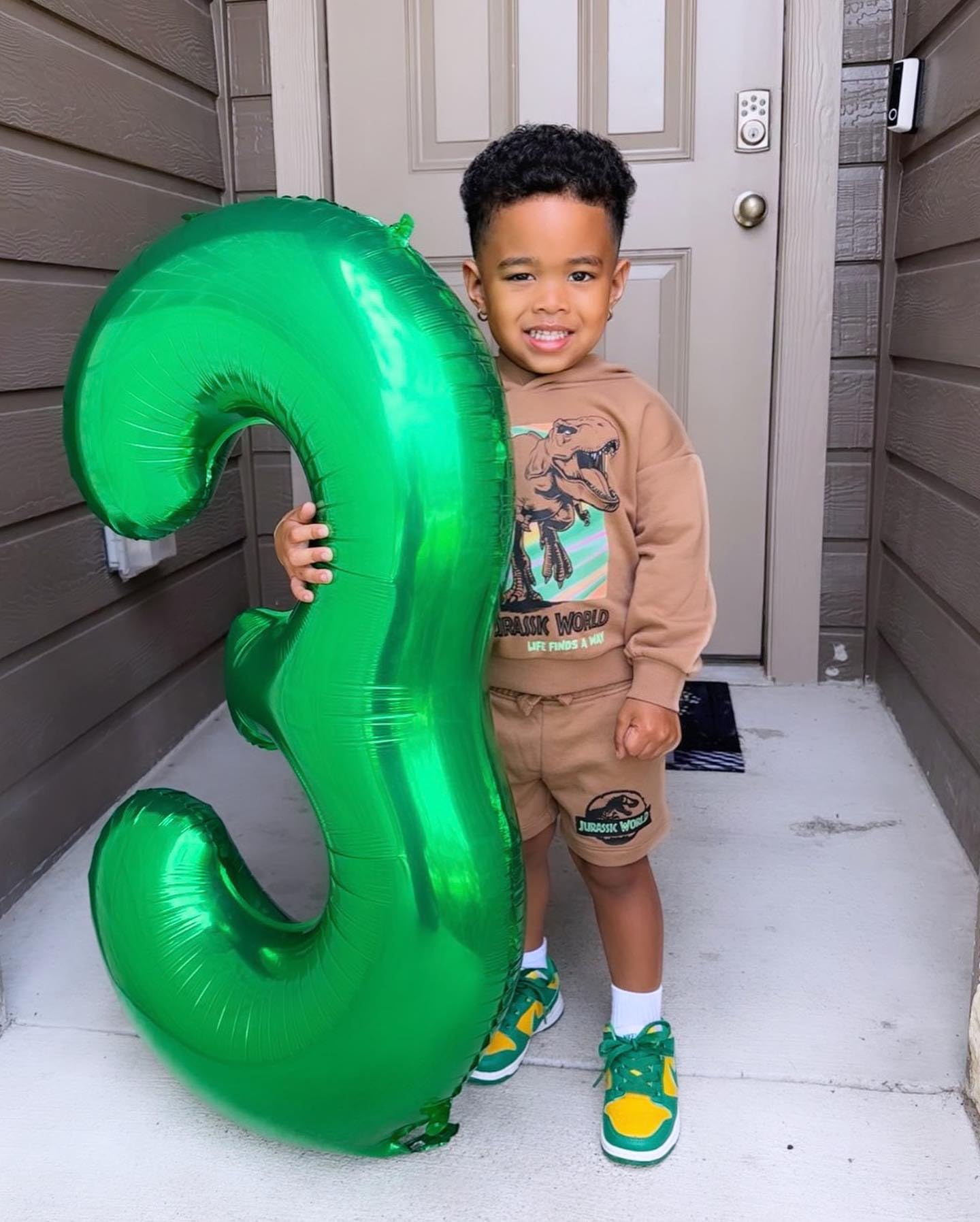 IWERP Green 50th birthday foil balloon creates a striking party focal point.