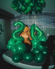 IWERP green-number-7 balloon backdrop for party decorations.