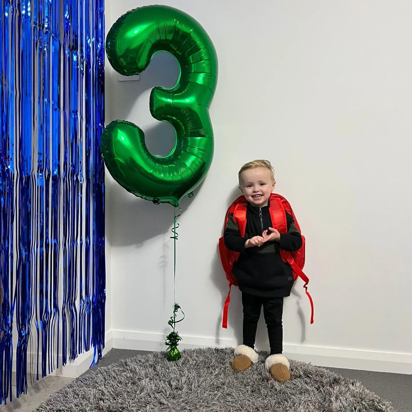 IWERP green party decor 7-balloon serves as a striking centerpiece.