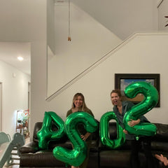 IWERP green theme party decor creates a photo-friendly backdrop.
