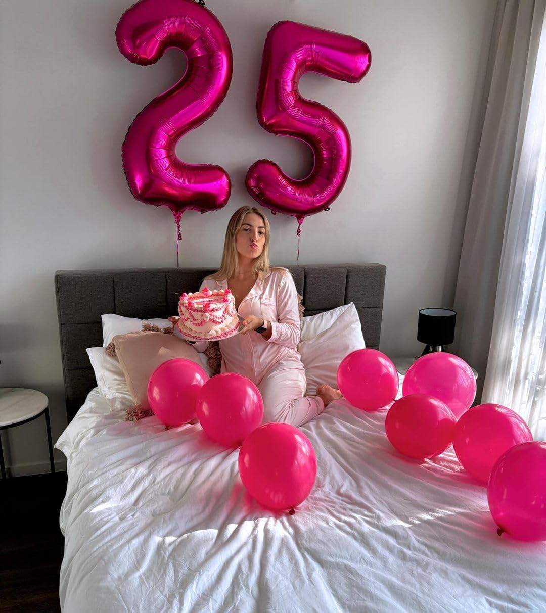 IWERP hot pink birthday backdrop balloon creates a festive focal point.