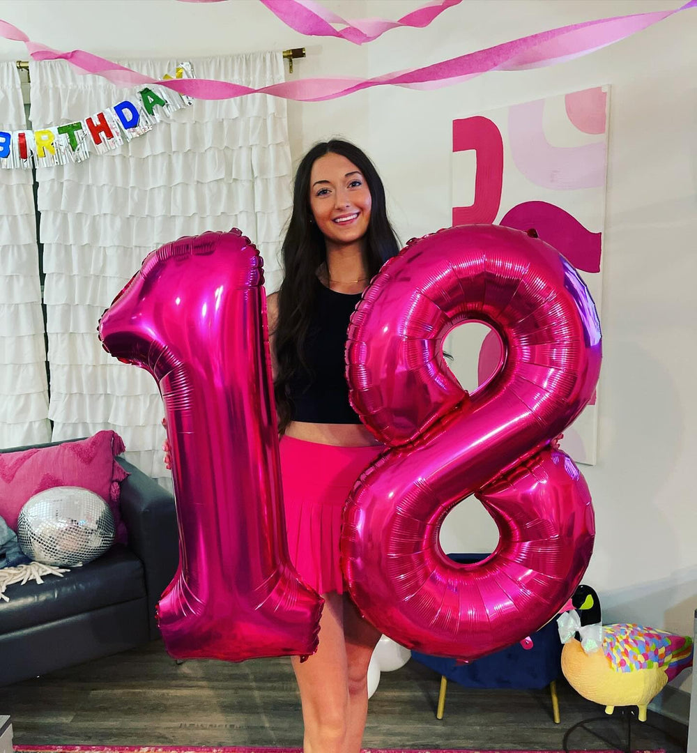 IWERP hot pink foil number 17 balloon adds dramatic backdrop