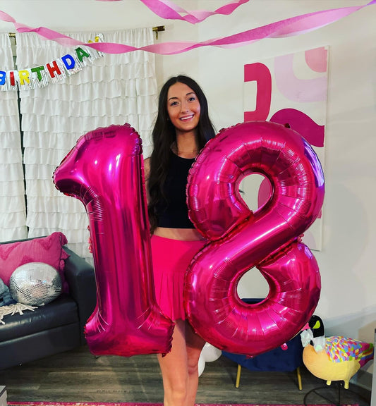 IWERP hot pink 16-number balloon backdrop for vibrant party photos