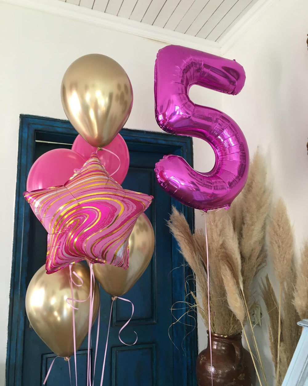 IWERP hot pink 5 balloon enhances birthday photo moments.