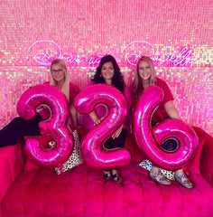 IWERP hot pink number balloon provides a striking photoshoot prop.
