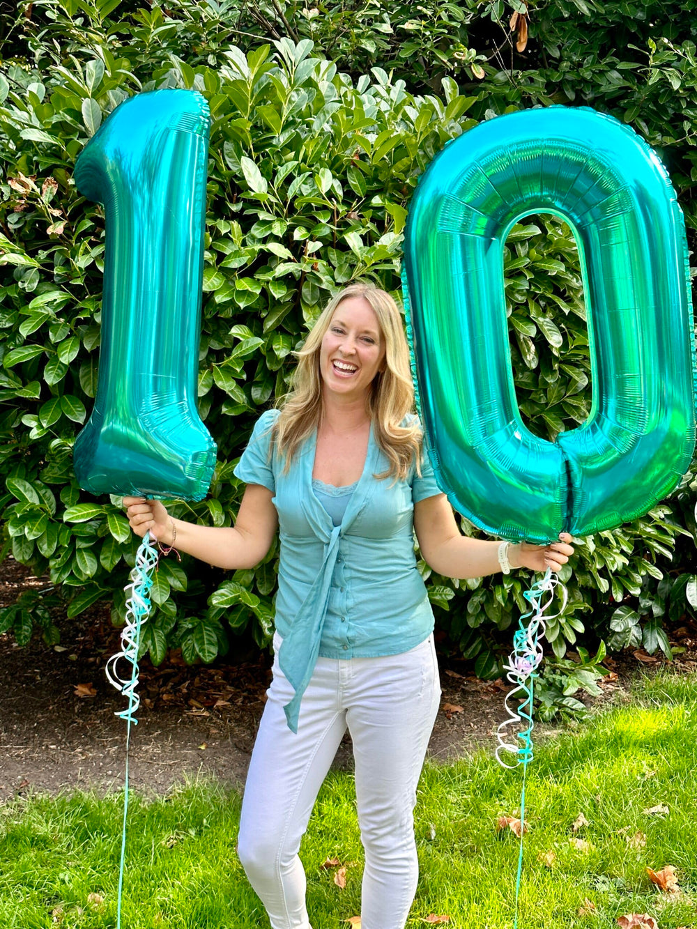 IWERP light-blue-0-balloon stage backdrop enhances photo moments