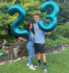 IWERP light blue 40-inch photo area balloons boost guest selfies.