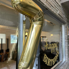 IWERP light gold balloon for versatile hanging or floating display.