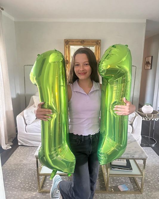 IWERP light-green Sixth birthday balloon adds a festive focal point for celebrations.