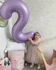 IWERP Lilac second birthday balloon set adds elegant ambiance to the room.