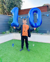 IWERP metallic blue 10th birthday balloon 40in brightens the party atmosphere.