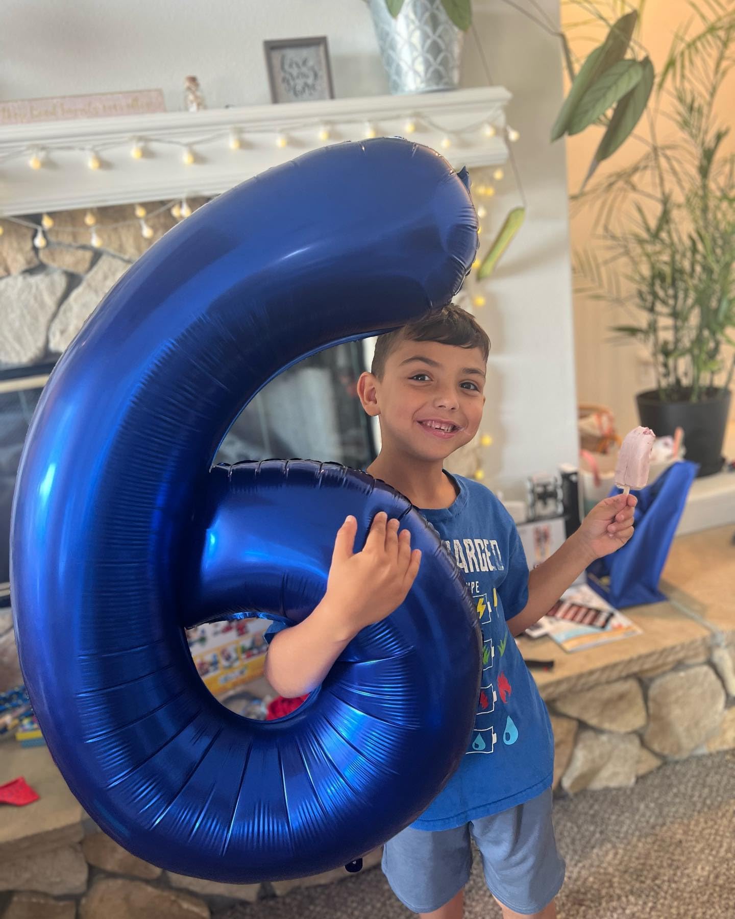 IWERP metallic blue number 6 balloon serves as a versatile centerpiece