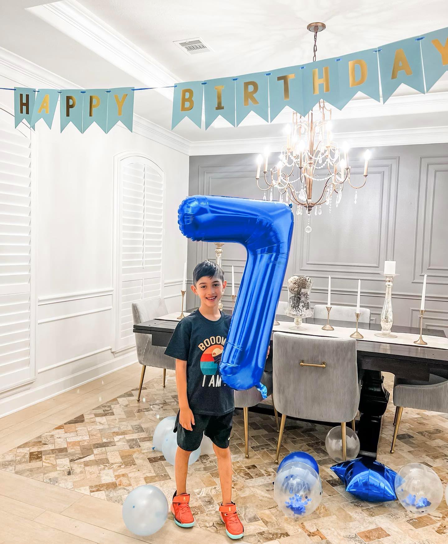 IWERP metallic blue 7 balloon as a photo prop and centerpiece.