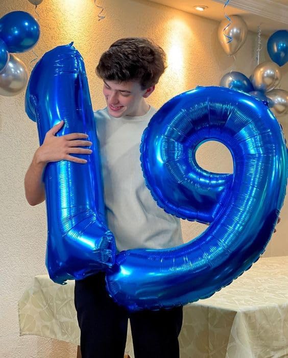 IWERP navy blue 4-balloon, 40-inch birthday decor focal point.