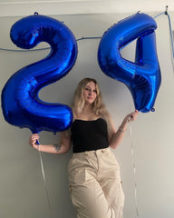 IWERP navy blue number balloon provides a focal point for festive moments.