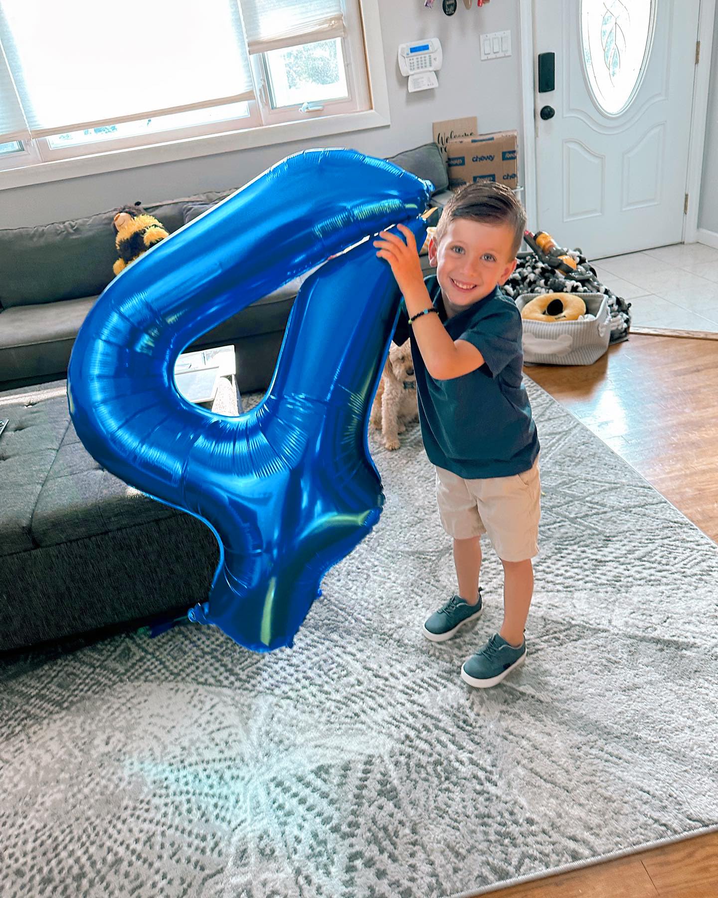 IWERP number 4 blue foil balloon adds vibrant celebration focal point.