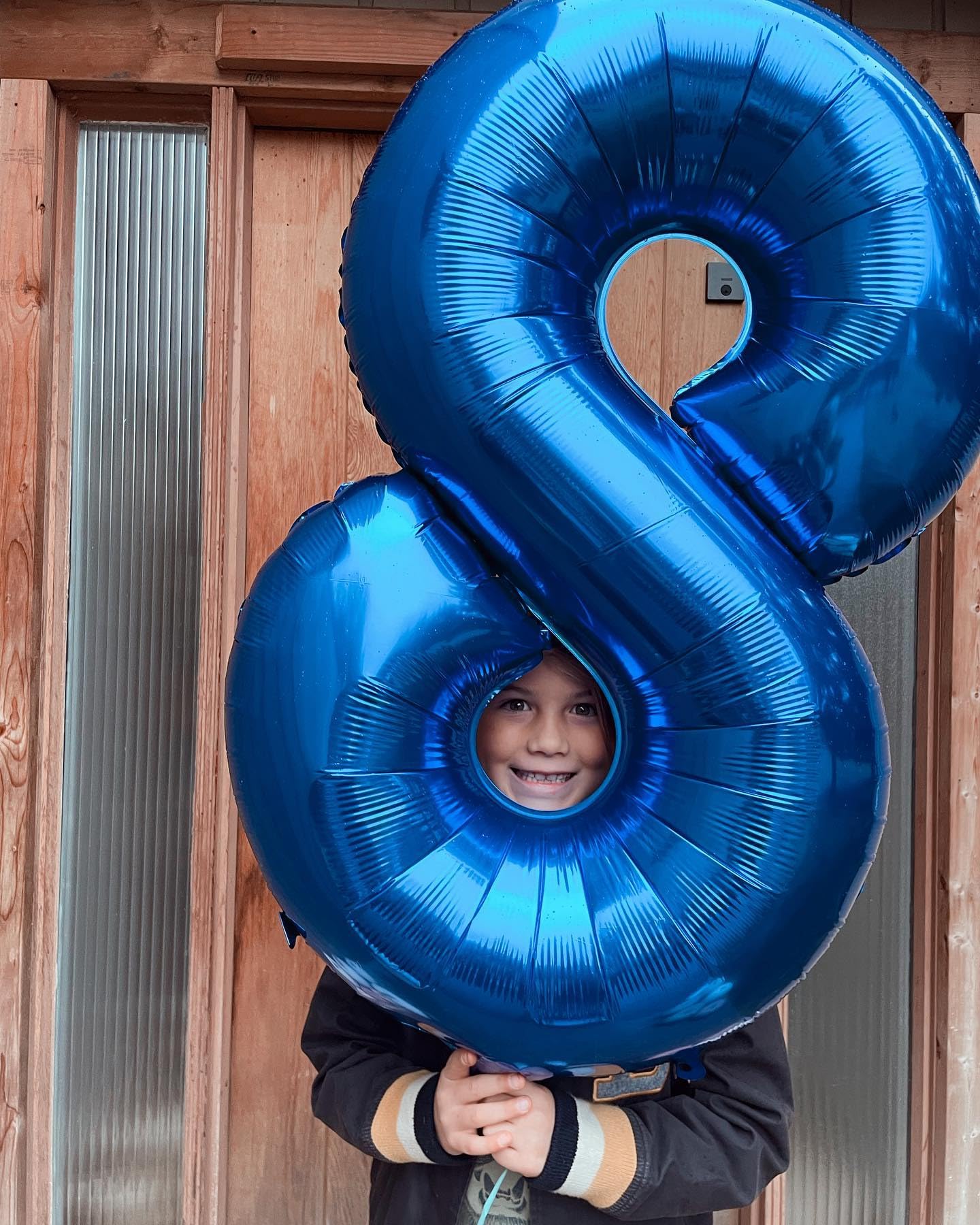 IWERP number 8 birthday balloon decor elevating party ambiance.