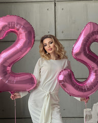 IWERP pink number 0 balloon entrance decor enhances guests' welcome.