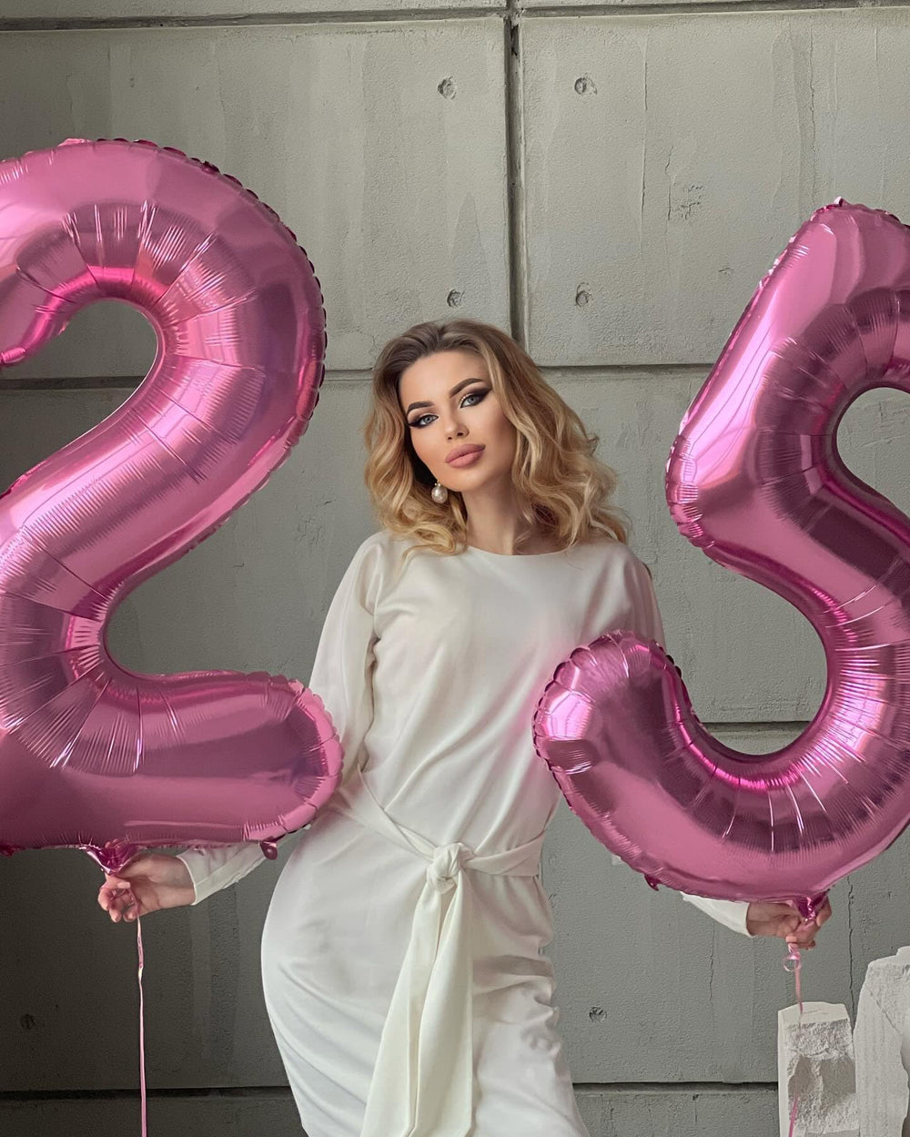 IWERP pink number 5 balloon stage backdrop adds festive flair to celebrations.